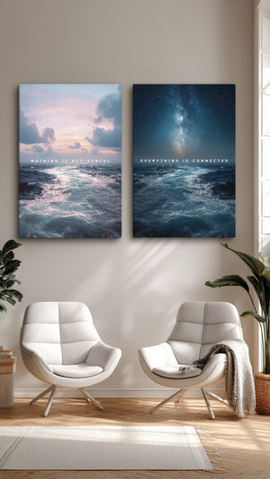 Two framed artworks of ocean scenes with text on a wall above two white chairs.
